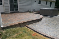 Raised Paver Patio Installed by Natures Elite Landscaping, Serving all of New Hampshire’s Lakes Region and beyond