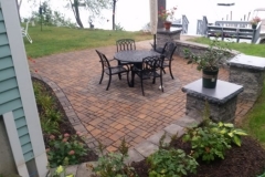 Belgard Permeable Pavers and sitting wall installed in Gilford, New Hampshire by Natures Elite Landscaping