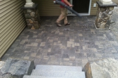 Granite steps and Belgard Pavers installed in Gilford, New Hampshire.